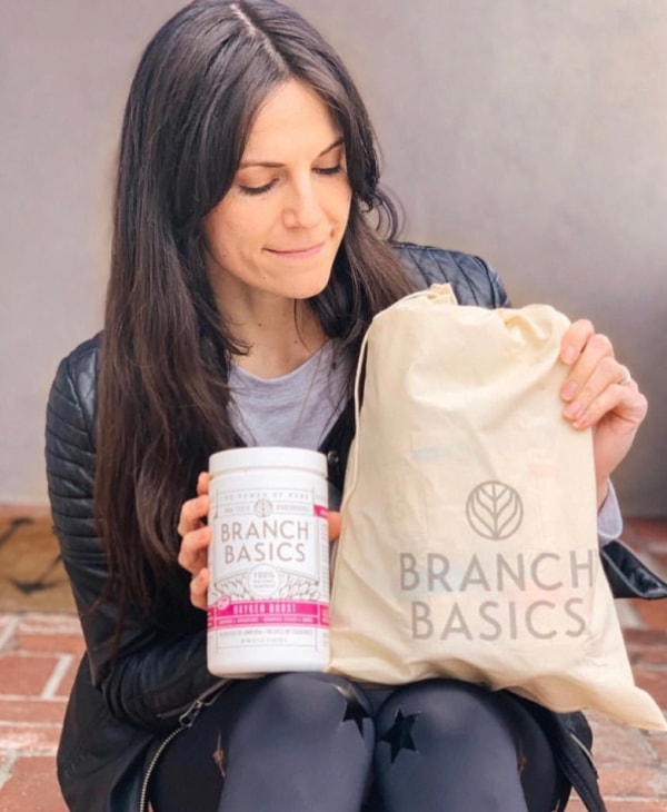 Woman posing with Branch Basics